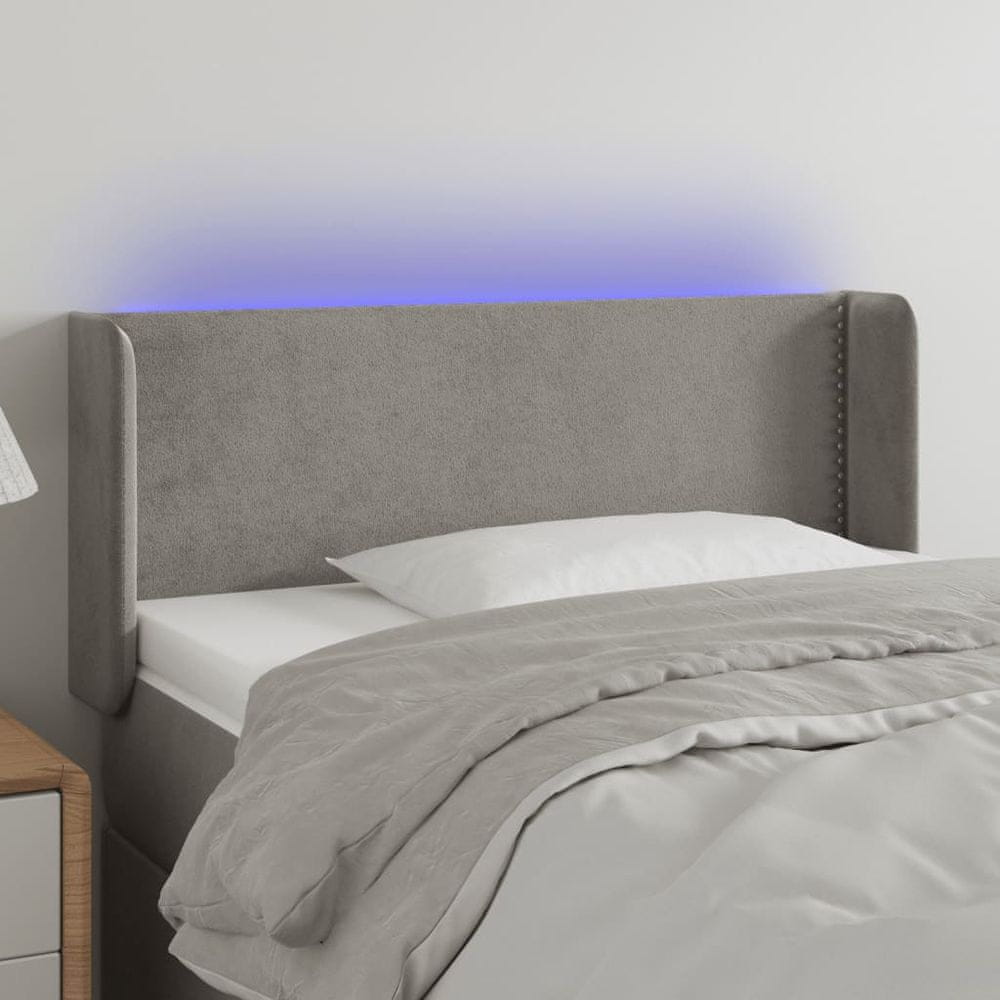 Vidaxl Čelo postele s LED bledosivé 103x16x78/88 cm zamat